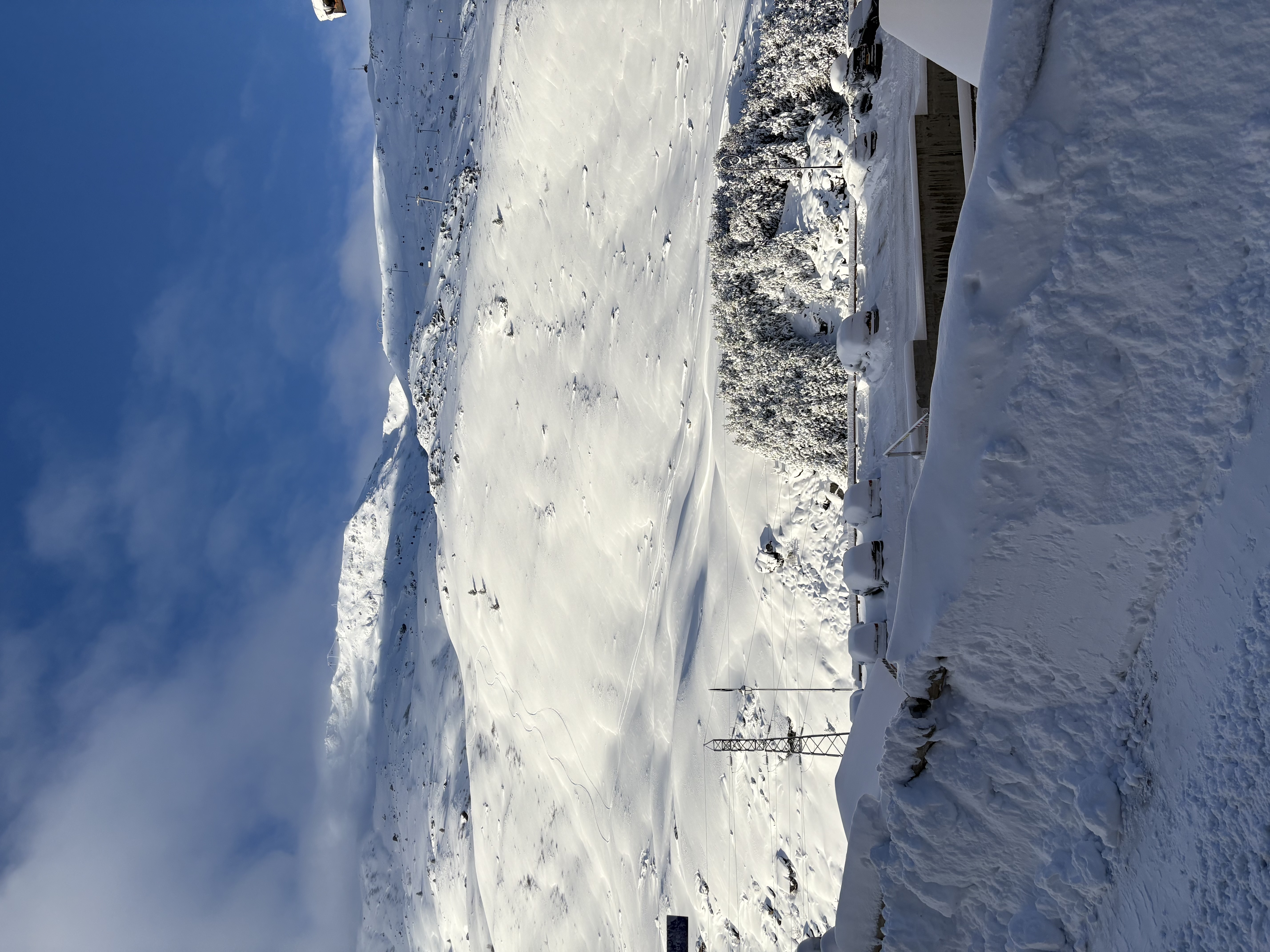 Alpine ski resort peak covered in snow - Find ski jobs at mountain resorts